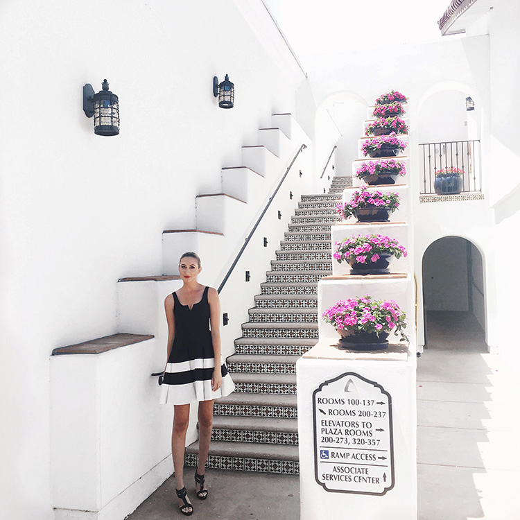 How to dress for opening day at the races: Carly Cristman wearing Halston Heritage black and white color blocked dress