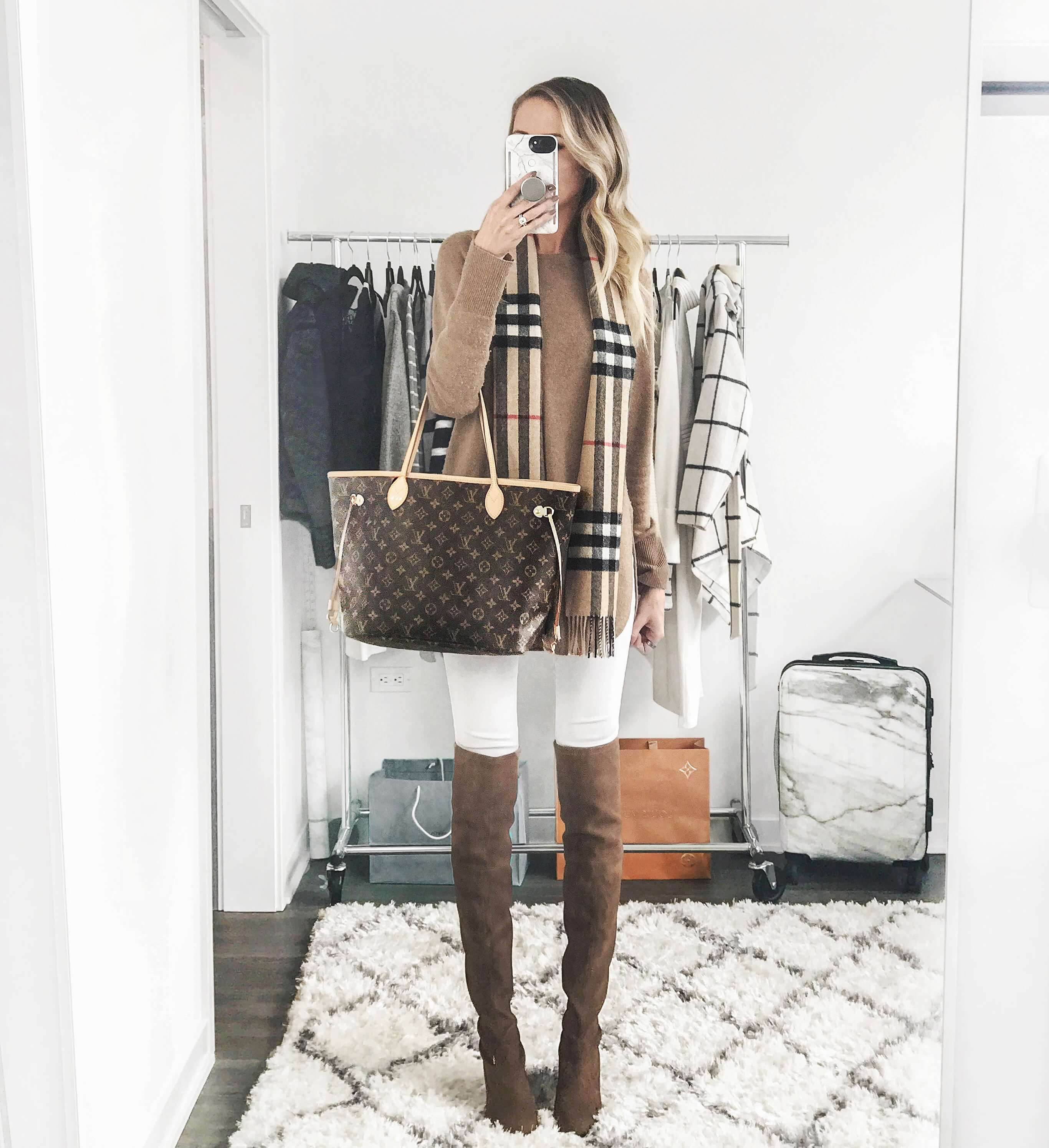 Carly Cristman wearing a camel Halogen cashmere sweater, Burberry giant check scarf, Stuart Weitzman Tieland boots, Louis Vuitton medium Neverfull MM bag, Lumee marble phone case, A Classic Neutral, How To Always Look Expensive